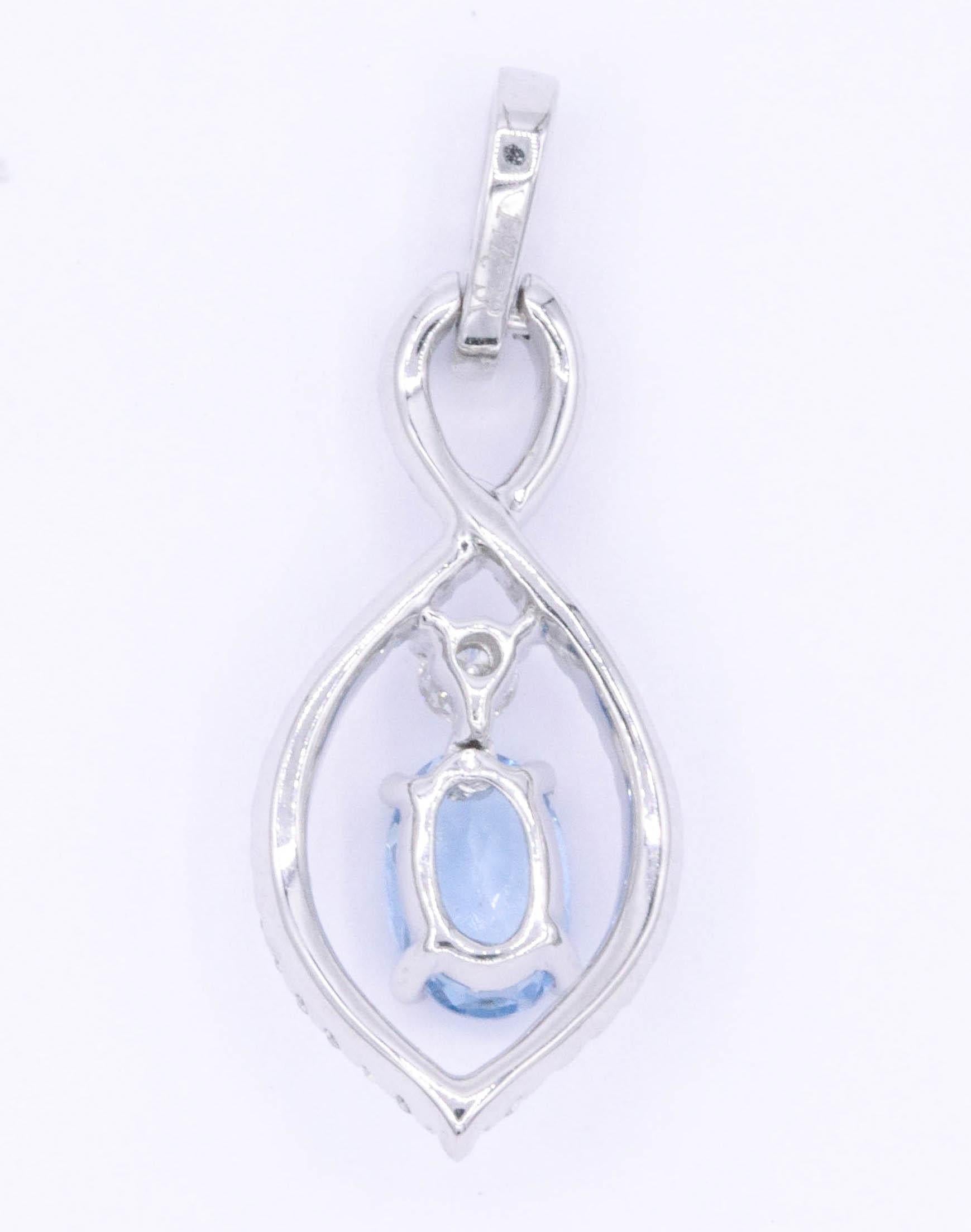 Oval Cut Oval Aquamarine and Diamond Pendant