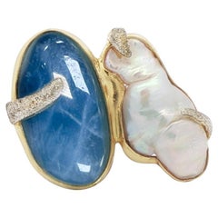 Anello da cocktail ovale placcato oro con acquamarina e madreperla, con fascia regolabile
