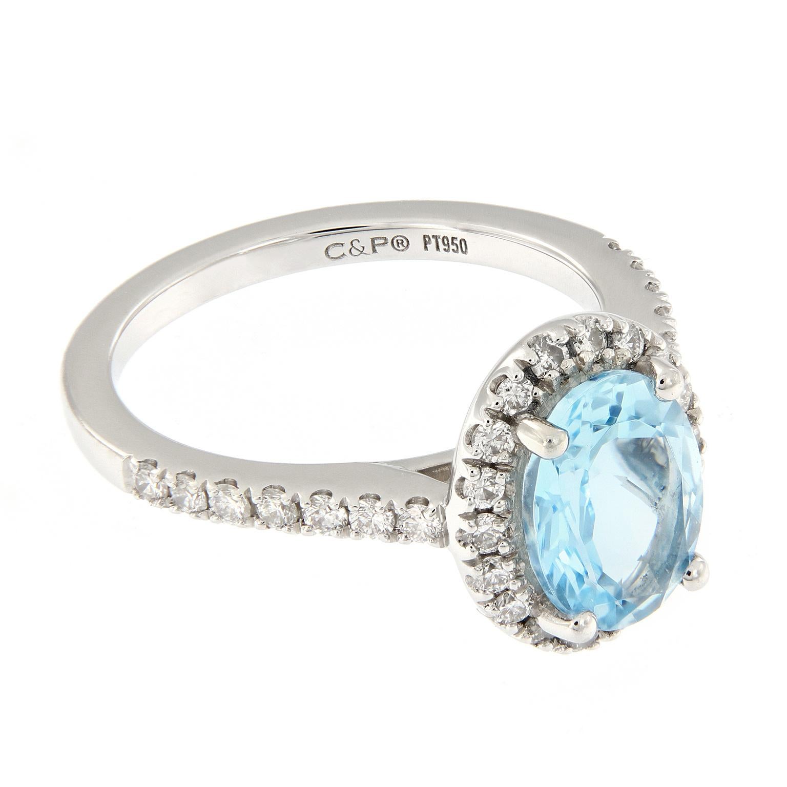 This pretty blue oval aquamarine is surrounded with a halo of diamonds. Enhancing the beauty of the platinum ring are the additional diamond accents on the shank. Top of ring measures 11 mm x 9 mm.
Ring size 4. Weighs 4.7 grams.

Aquamarine 1.27