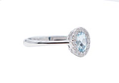 Oval Aquamarine, White Diamonds, 18 Karat White Gold Modern Ring