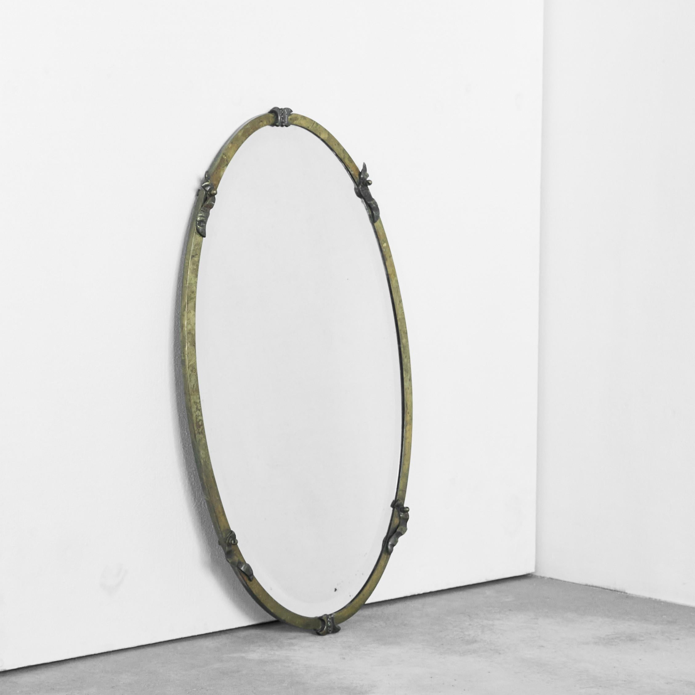 Oval Art Deco Mirror in Patinated Brass and Beveled Glass 1930s 1