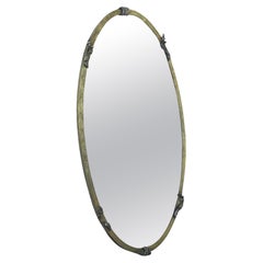 Antique Oval Art Deco Mirror in Patinated Brass and Beveled Glass 1930s