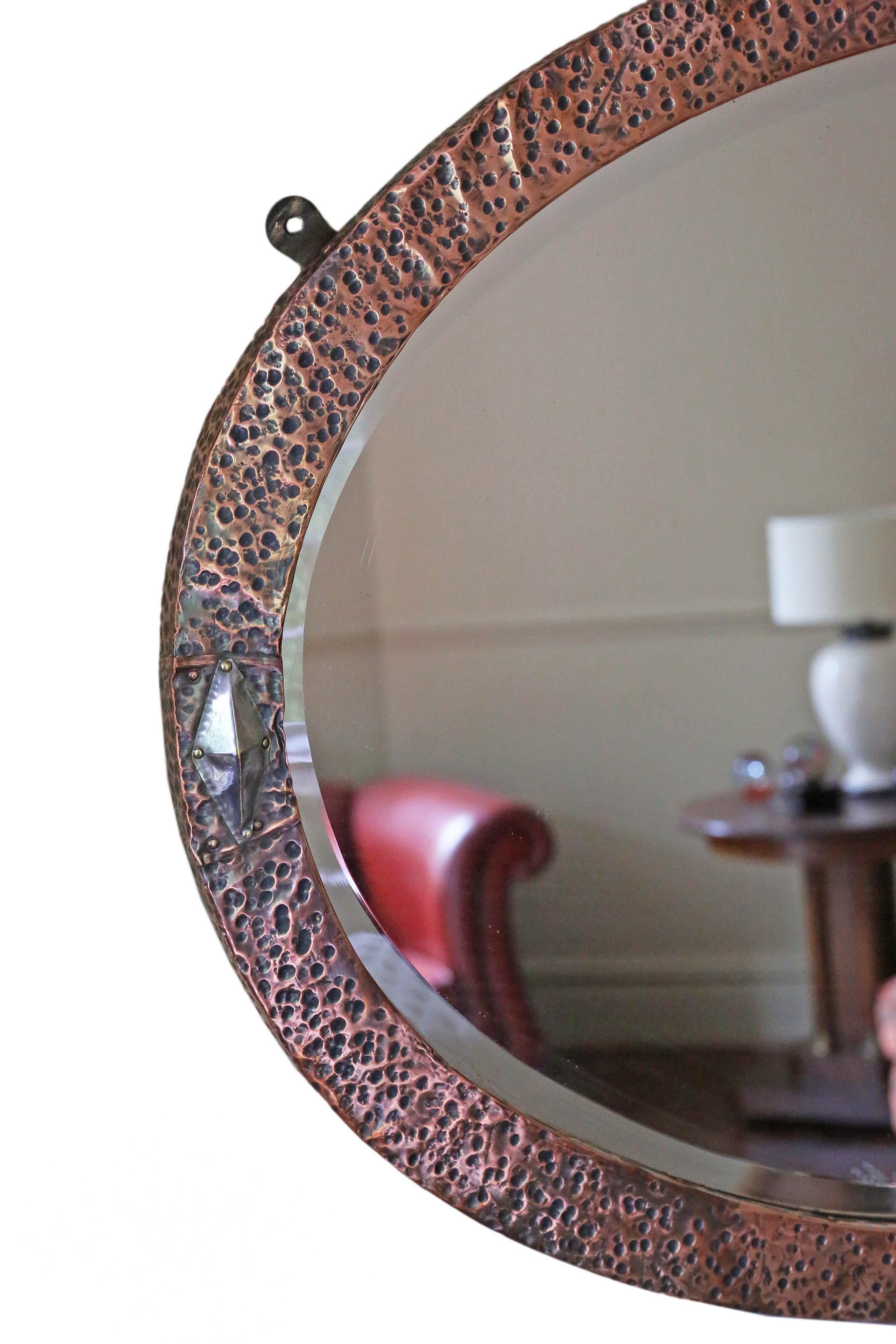 Antique quality oval Art Nouveau copper and brass overmantle or wall mirror, circa 1910.
This is a lovely mirror in a great frame in very good condition, looks great.
An impressive and rare find that would look amazing in the right location.
The