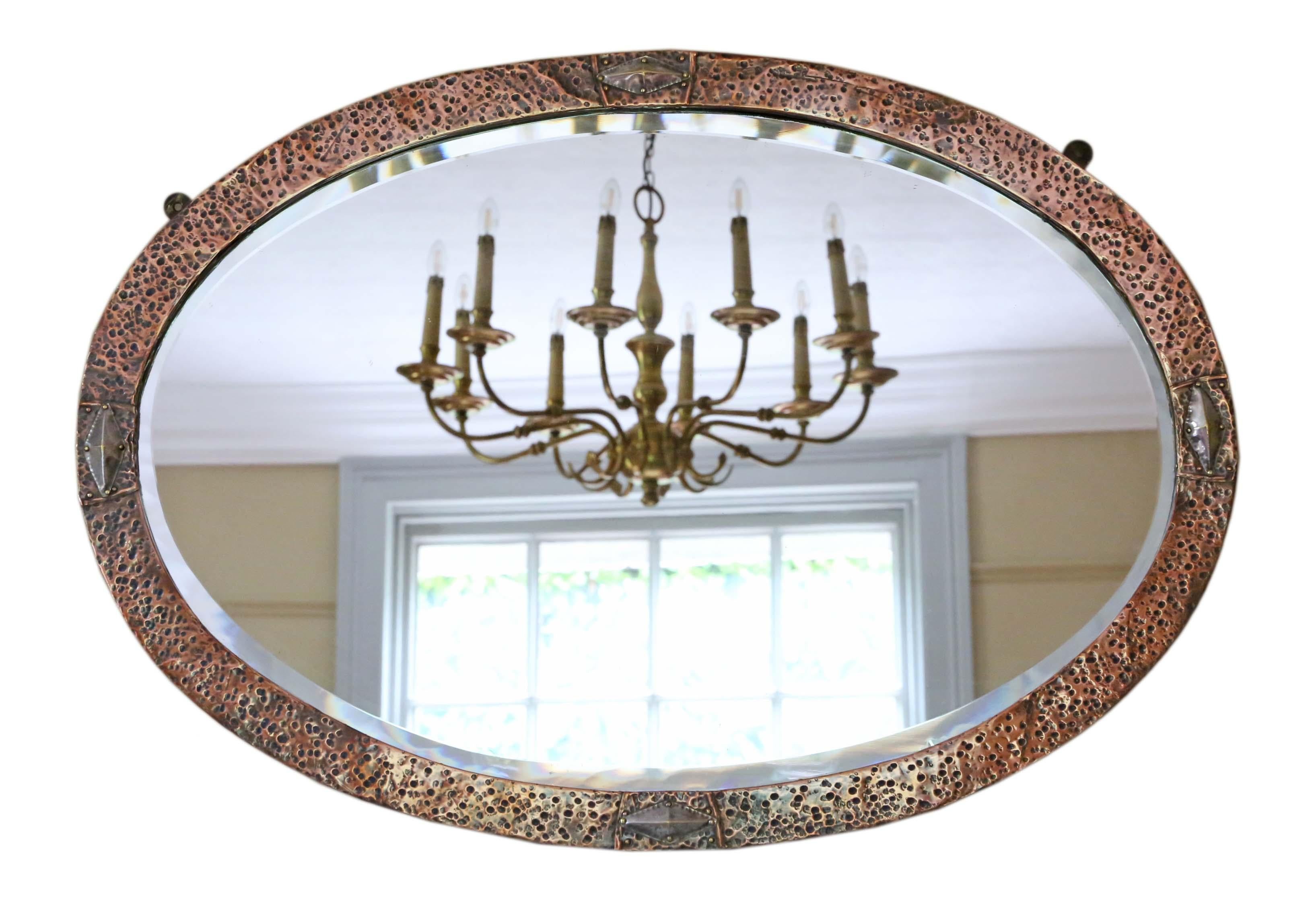 Early 20th Century Oval Art Nouveau Copper and Brass Wall Overmantle Mirror For Sale