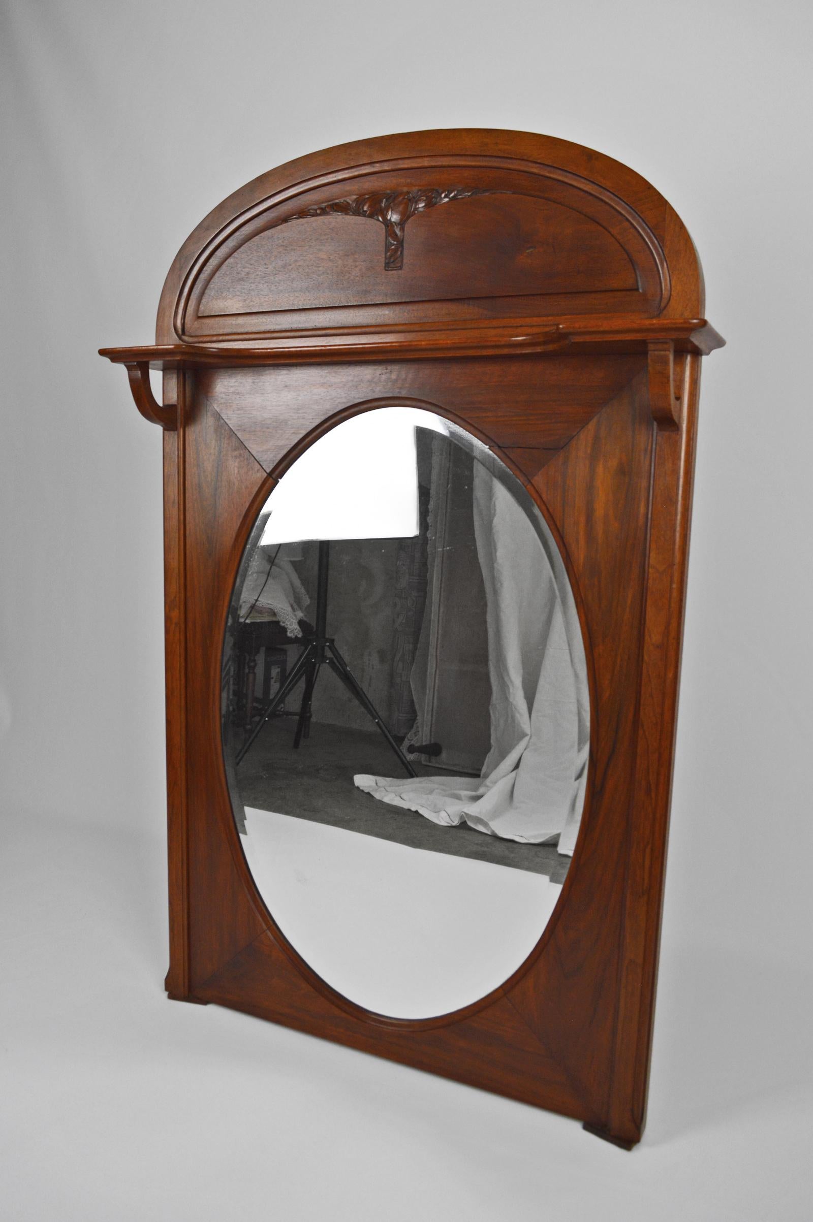 Beveled Oval Art Nouveau Fireplace Mirror in Carved Walnut, France, circa 1910 For Sale