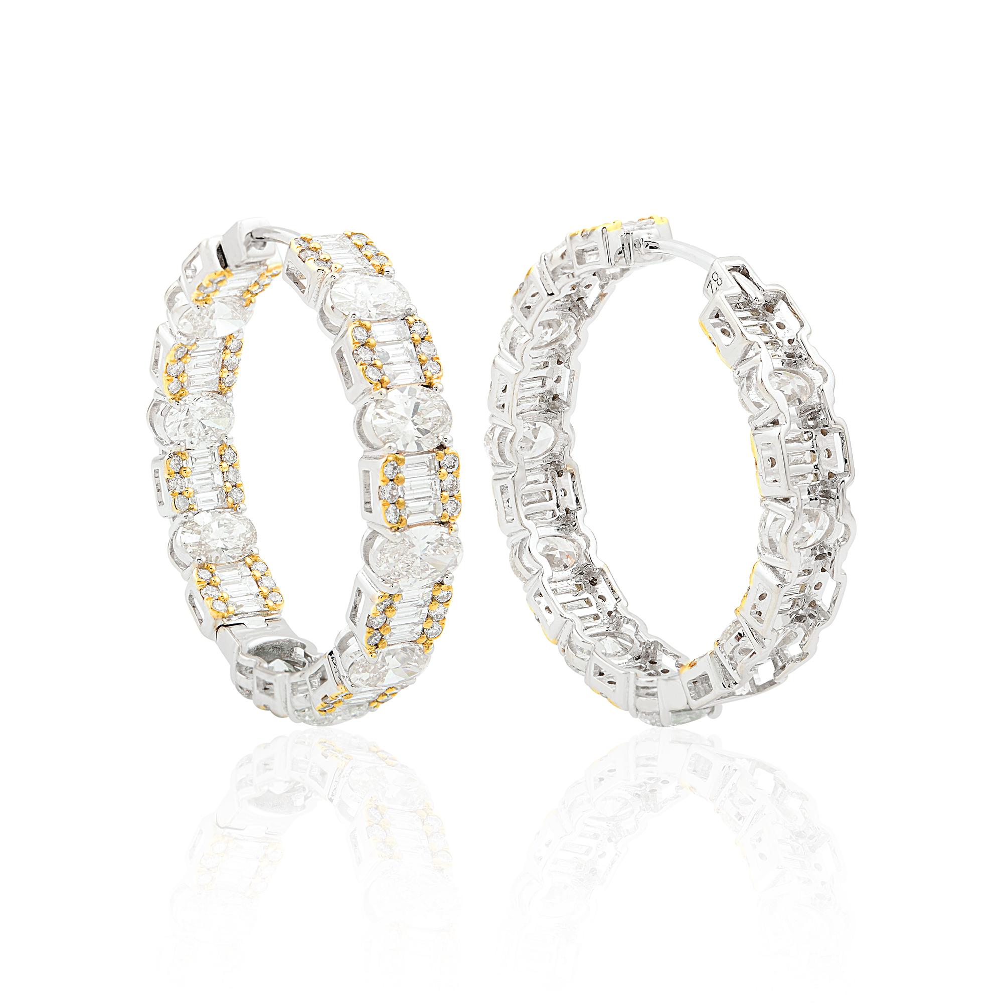 Elevate your style with these exquisite Oval Baguette Diamond Hoop Earrings, a stunning blend of elegance and sophistication. Crafted from the finest 18 karat white and yellow gold, these earrings are a true testament to luxury craftsmanship.

Item