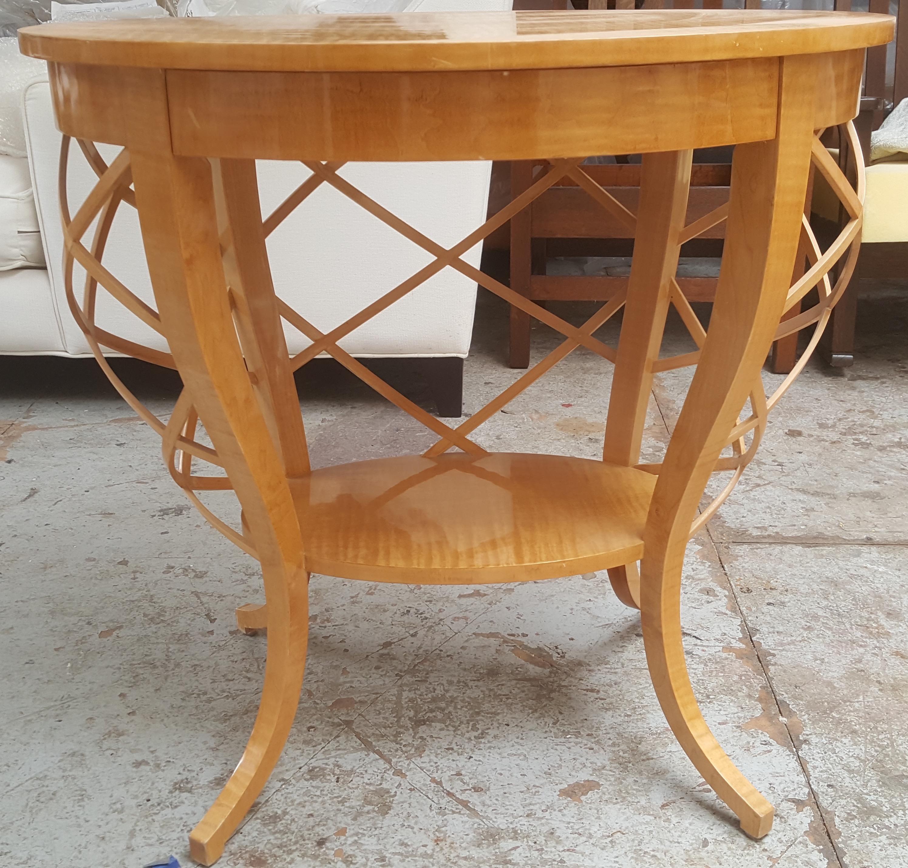 Solid curly maple and curly maple veneer with hand rubbed lacquer finish. One drawer at front.