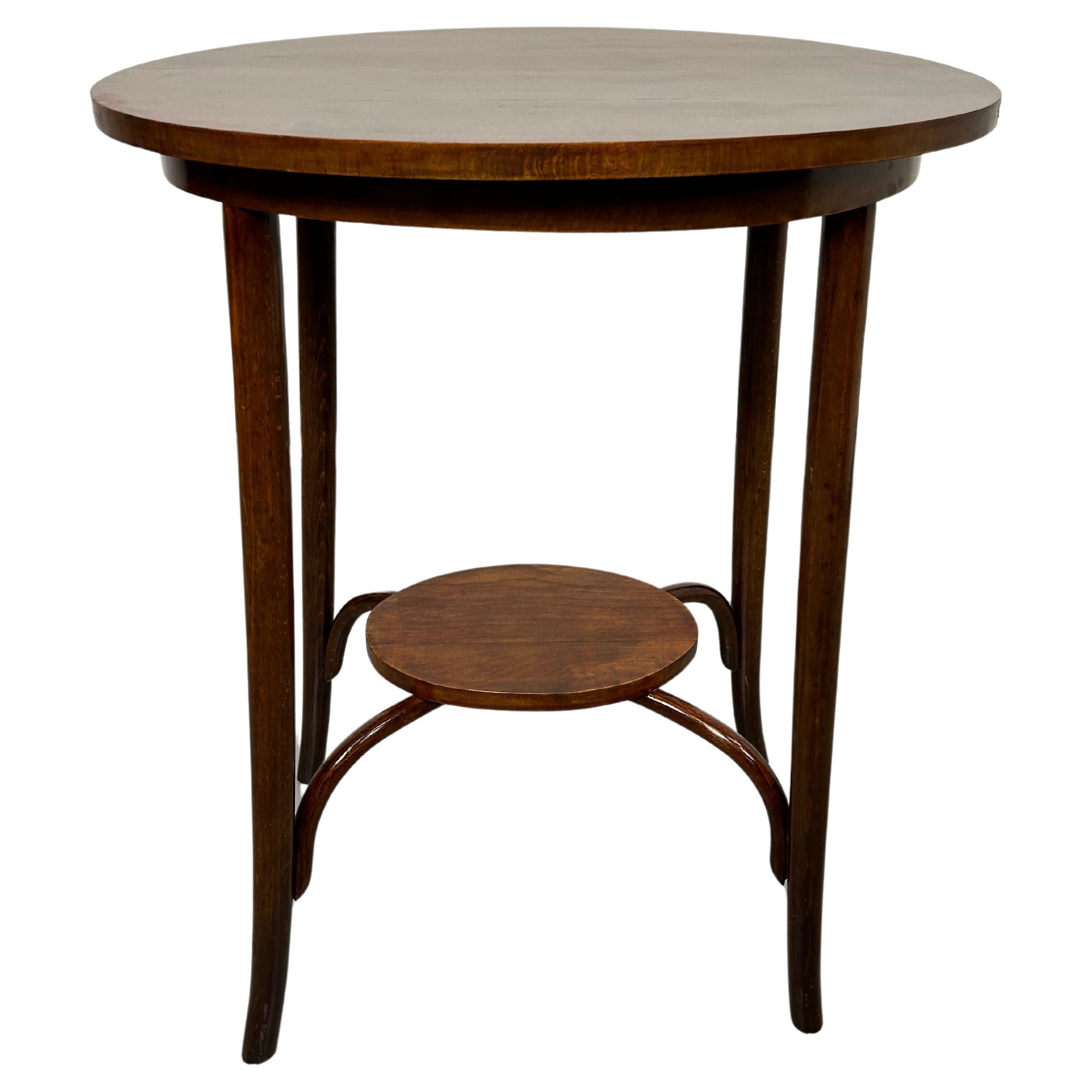 Oval bentwood table by Thonet