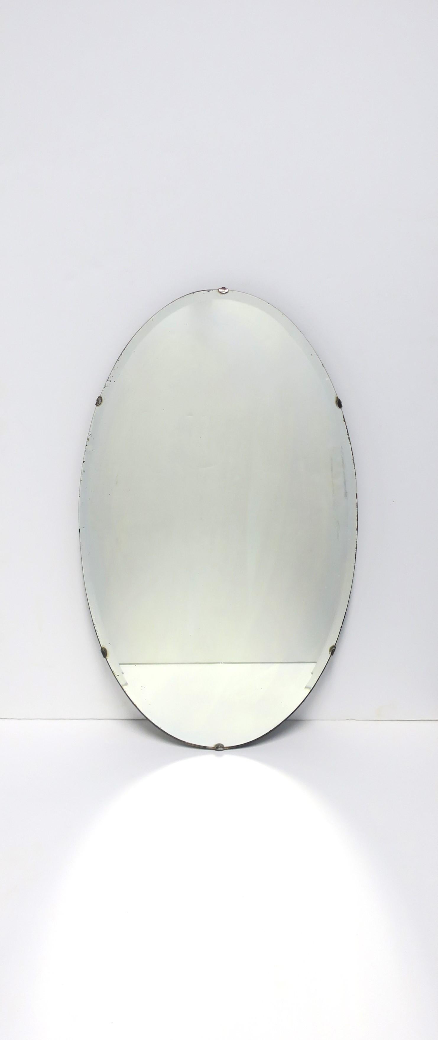 American Oval Wall Mirror, circa Early 20th Century For Sale