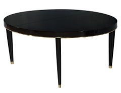 Oval Black Lacquer Dining Table with Brass Trim Accents