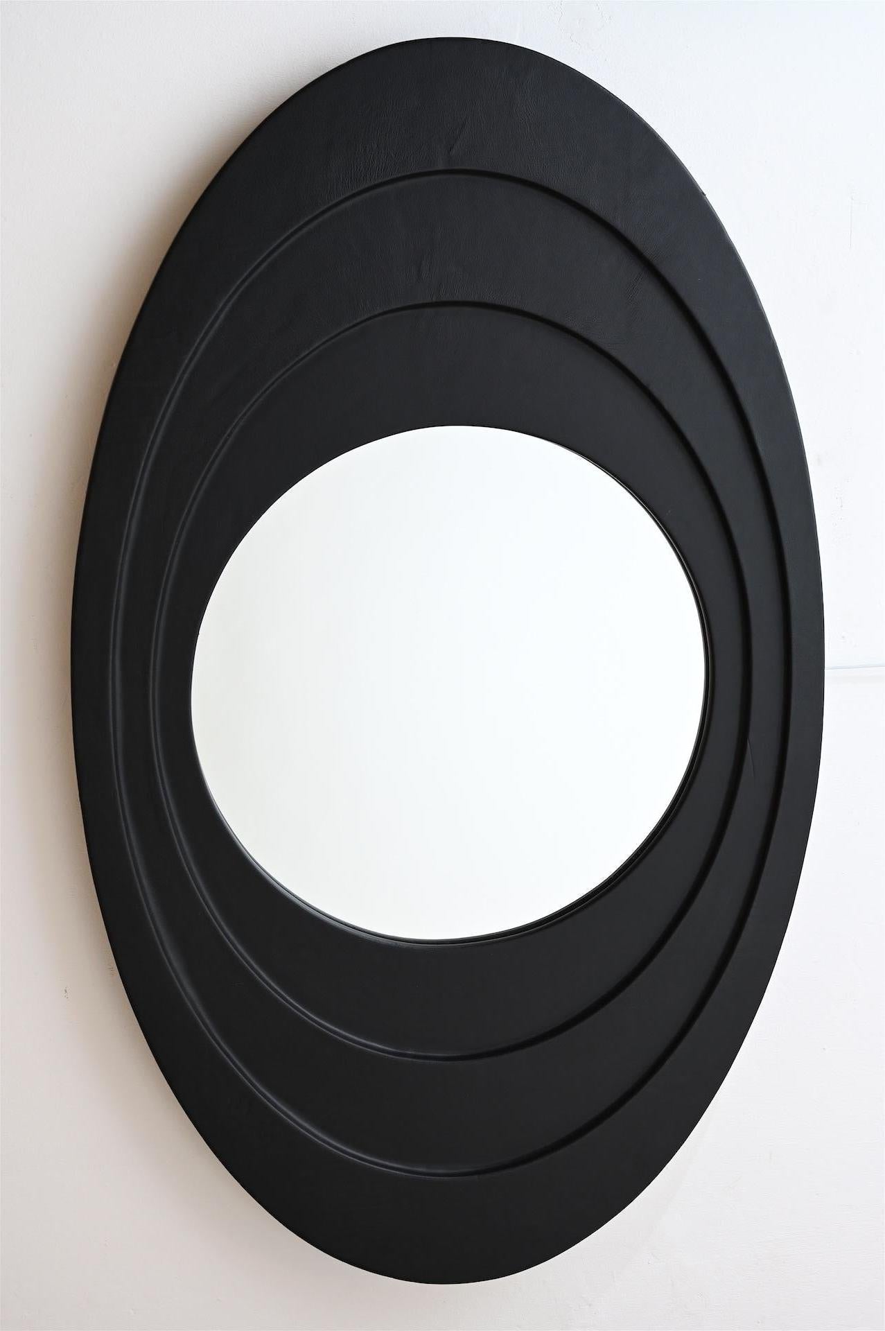 Mid-Century Modern Oval Black Leather Framed Mirror For Sale