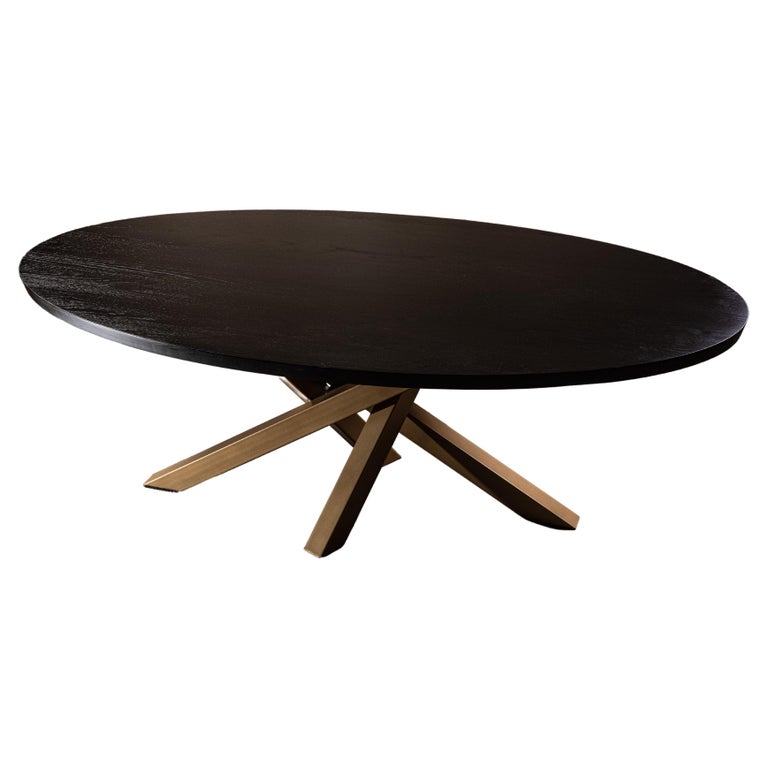 Oval Black Oak Dining Table, Criss Cross Golden Base For Sale at 1stDibs