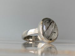 Oval Black tourmaline in quartz