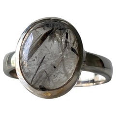 Oval Black tourmaline in quartz