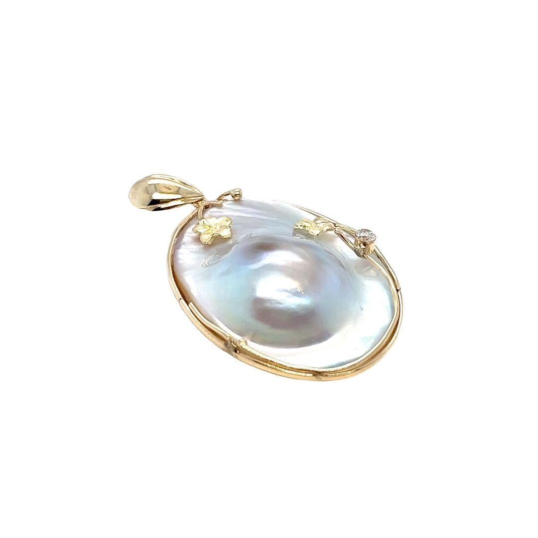 Oval Blister Pearl Pendant with Flower Accent 1