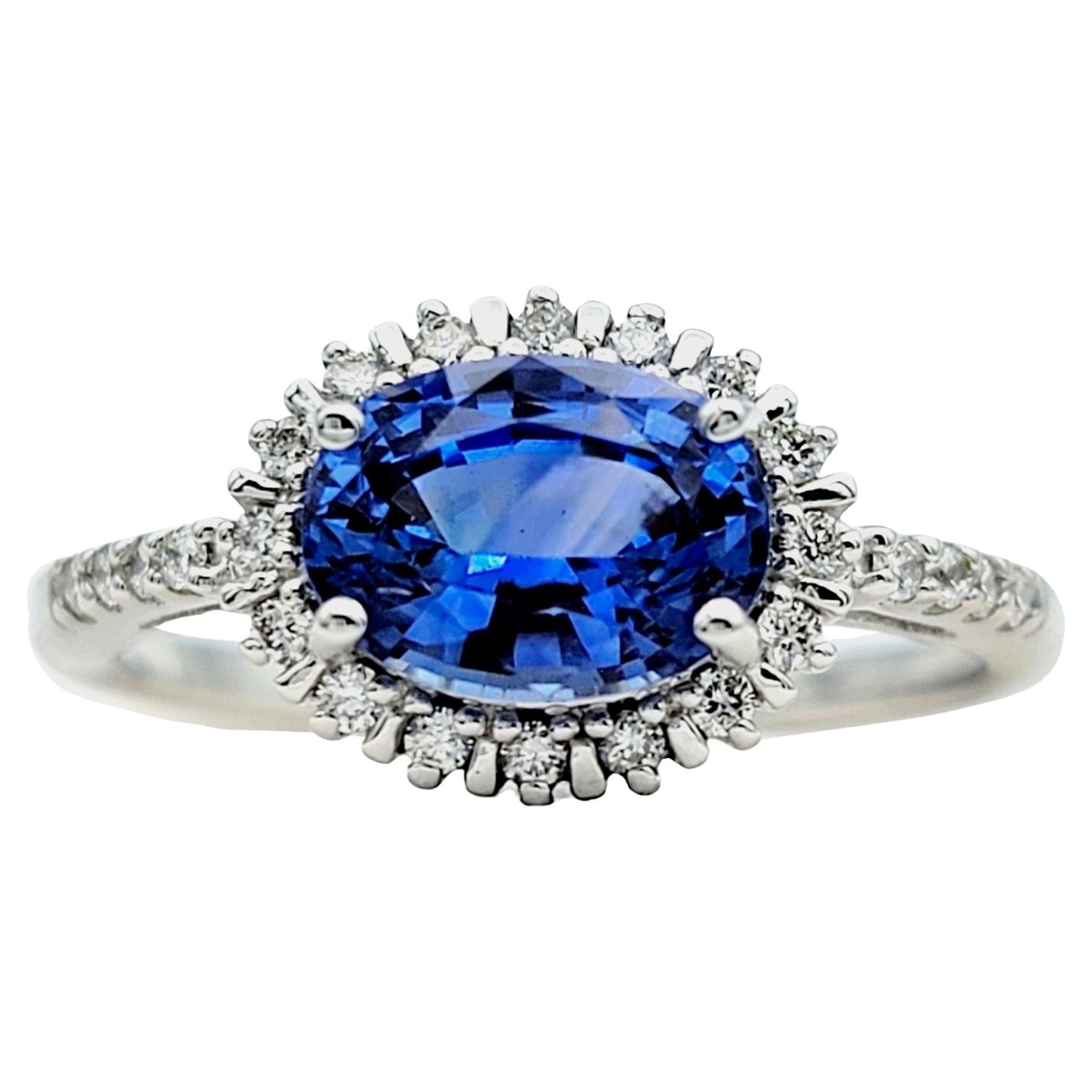 Oval Blue Ceylon Sapphire and Diamond Halo Cocktail Ring in 18 Karat White Gold