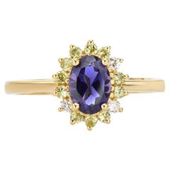 Bague ovale en Iolite bleue, péridot vert et diamants en 18Kt  Or jaune