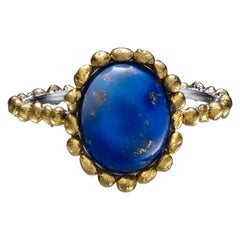 Oval Blue Lapis Cabochon Ring in 24 Karat Gold and Platinum