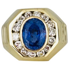 Oval Blue Sapphire, 3.00 Carat Set in Diamond Halo Ring