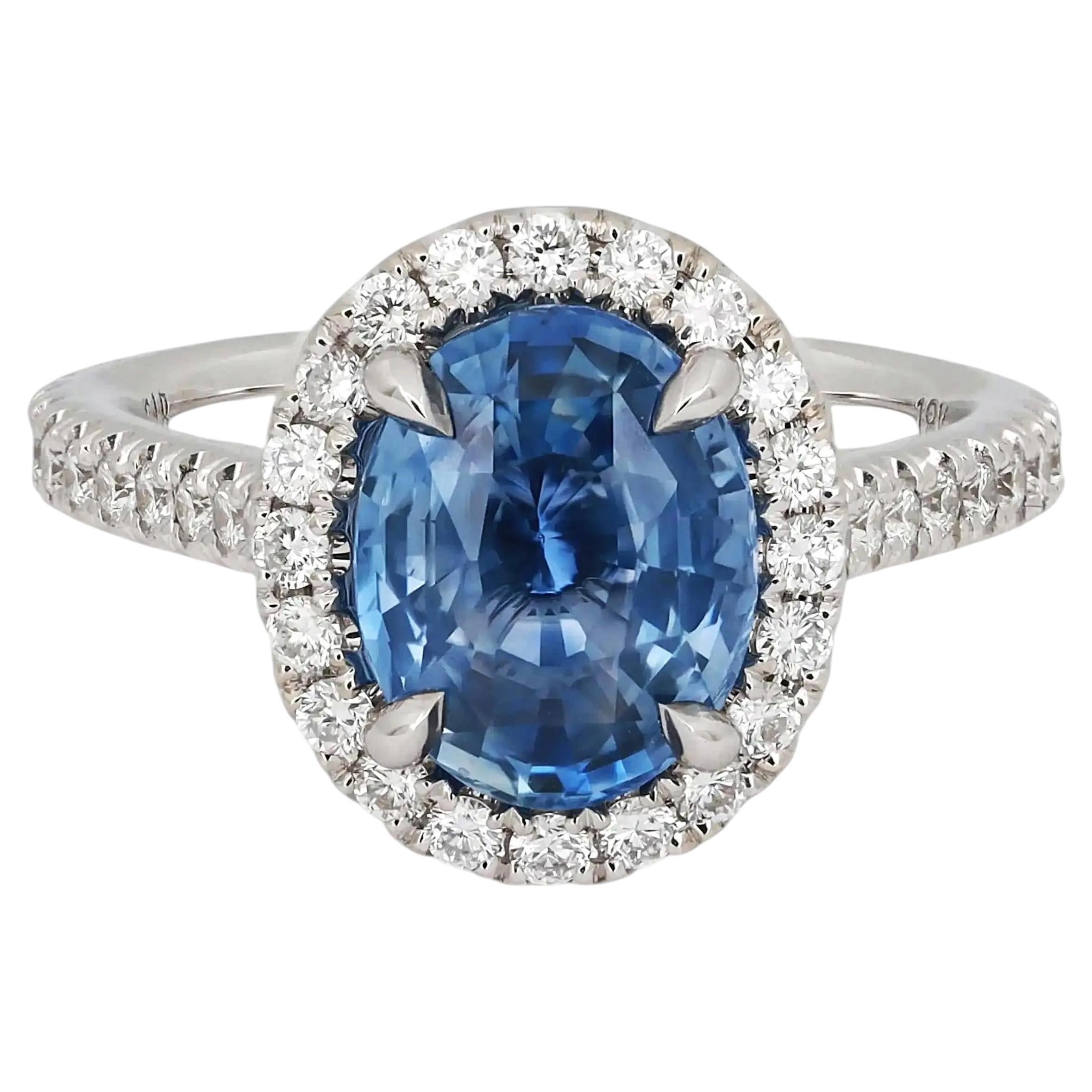 Anello di fidanzamento con zaffiro blu ovale da 3,22 carati e diamante da 0,70 carati in oro bianco 18 carati
