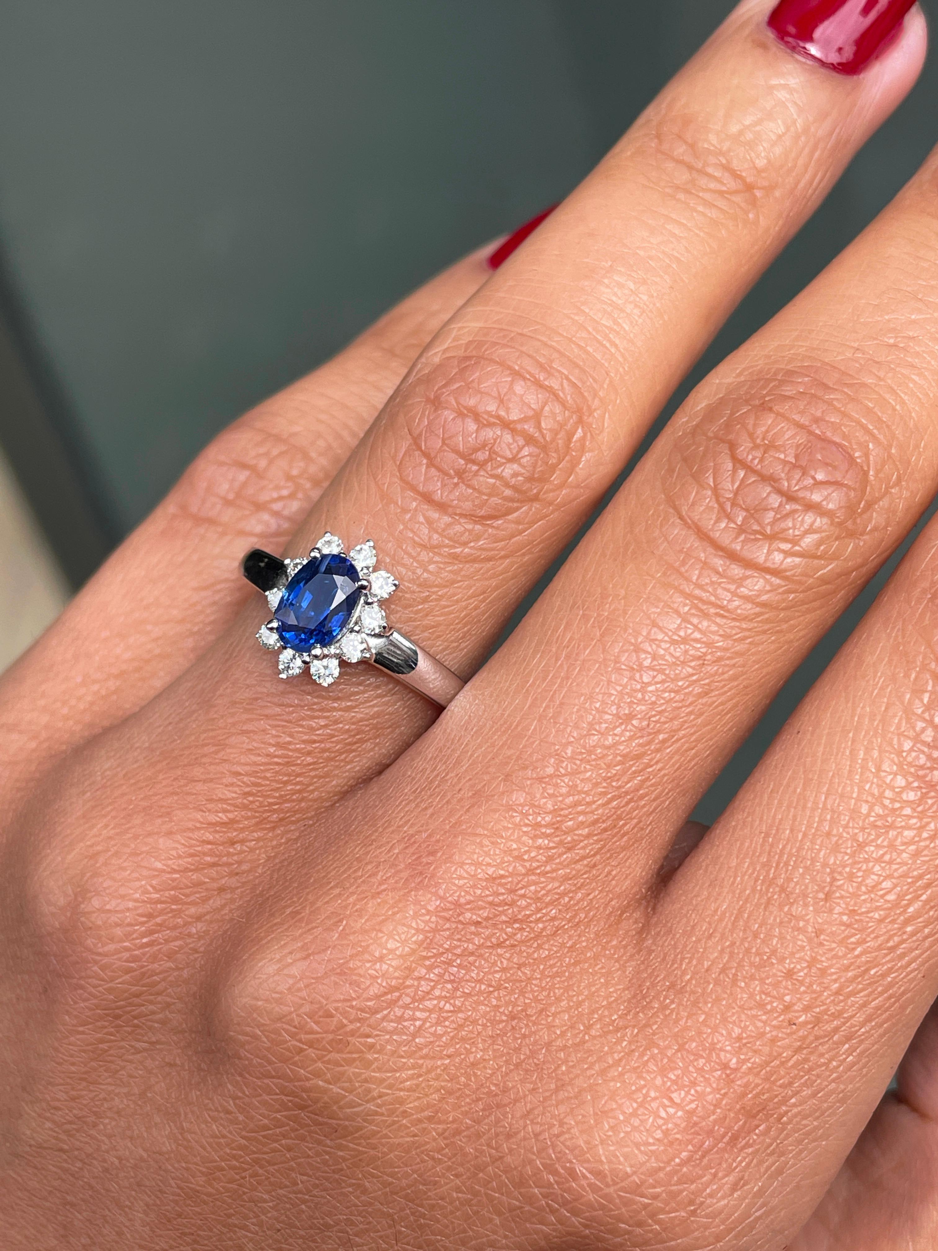 Oval Cut Oval Blue Sapphire and Diamond 18 Carat White Gold Cluster Engagement Ring For Sale