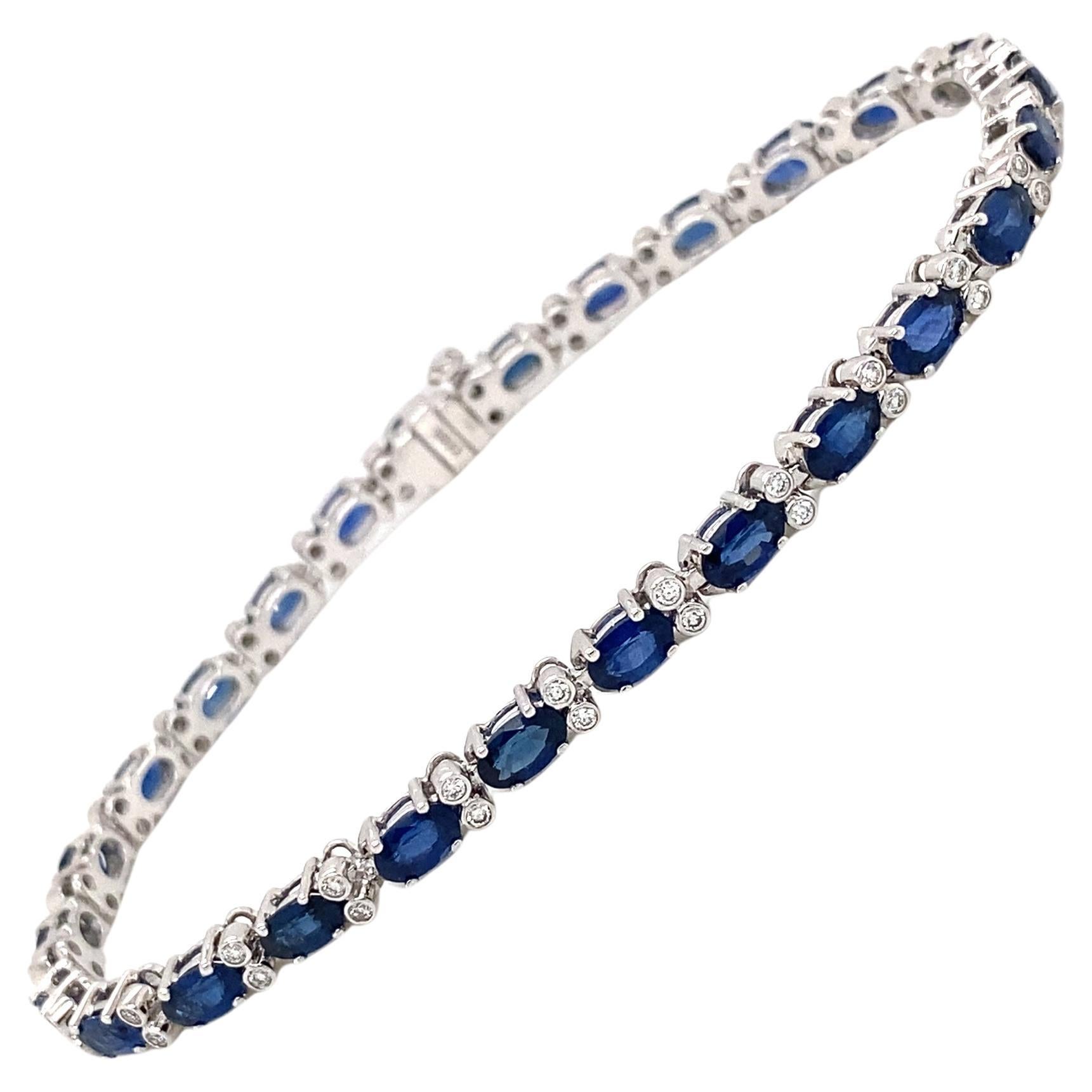 Bracelet tennis en or blanc 18 carats, saphir bleu ovale et diamants