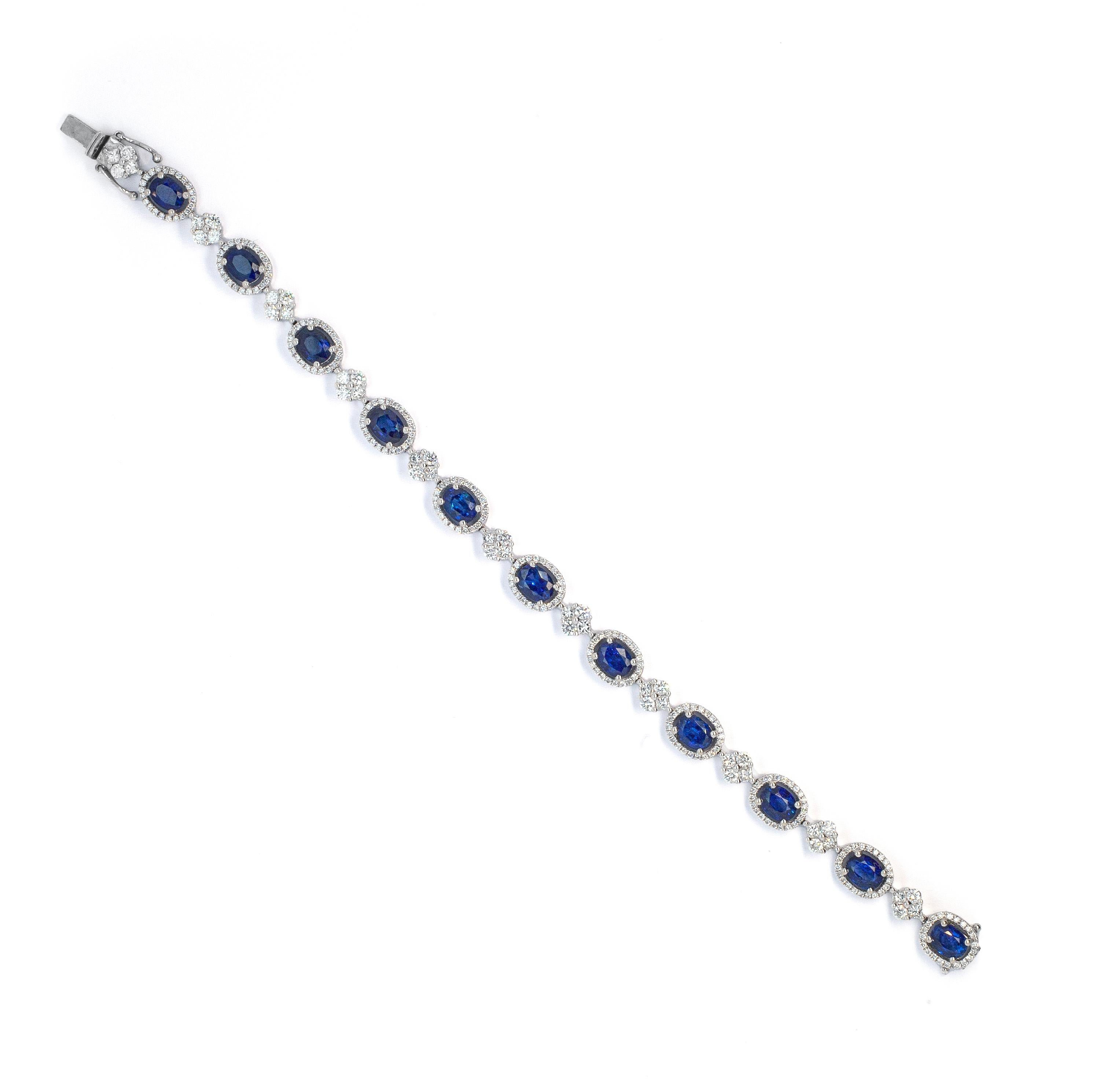 This is a stunning bracelet, exquisitely crafted in high polish 18 carat white gold, ready to make a lasting impression whenever it is worn.

The focal point of this exquisite bracelet is the alternating pattern consisting of 11 lively blue oval