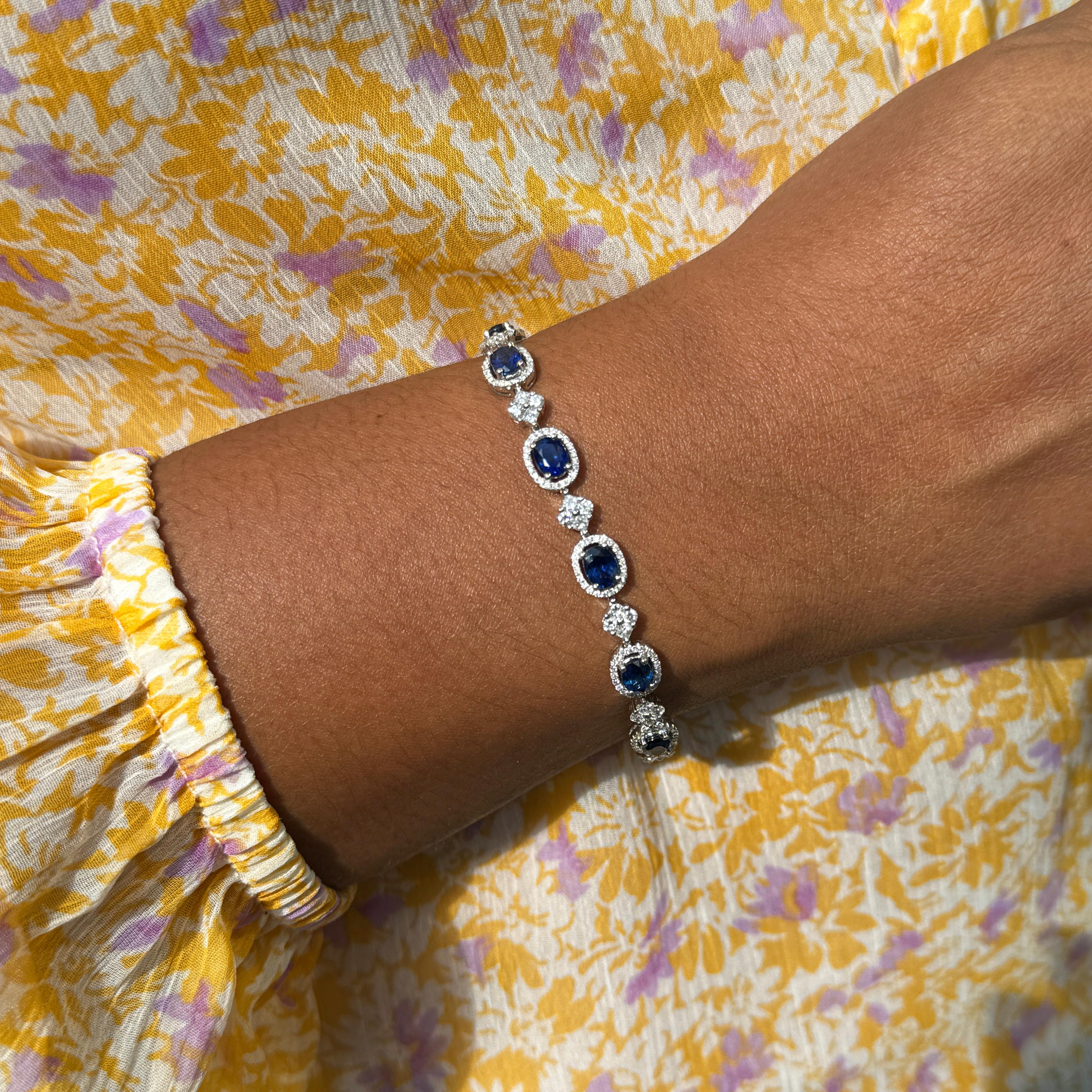 Modern Oval Blue Sapphire and Diamond Cluster 18 Carat White Gold Bracelet For Sale