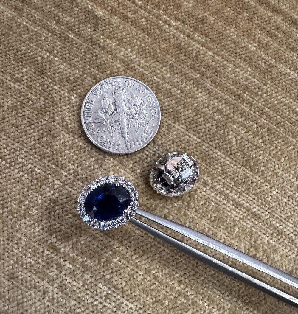 Women's Oval Blue Sapphire and Diamond Halo Earrings in 14k White Gold For Sale