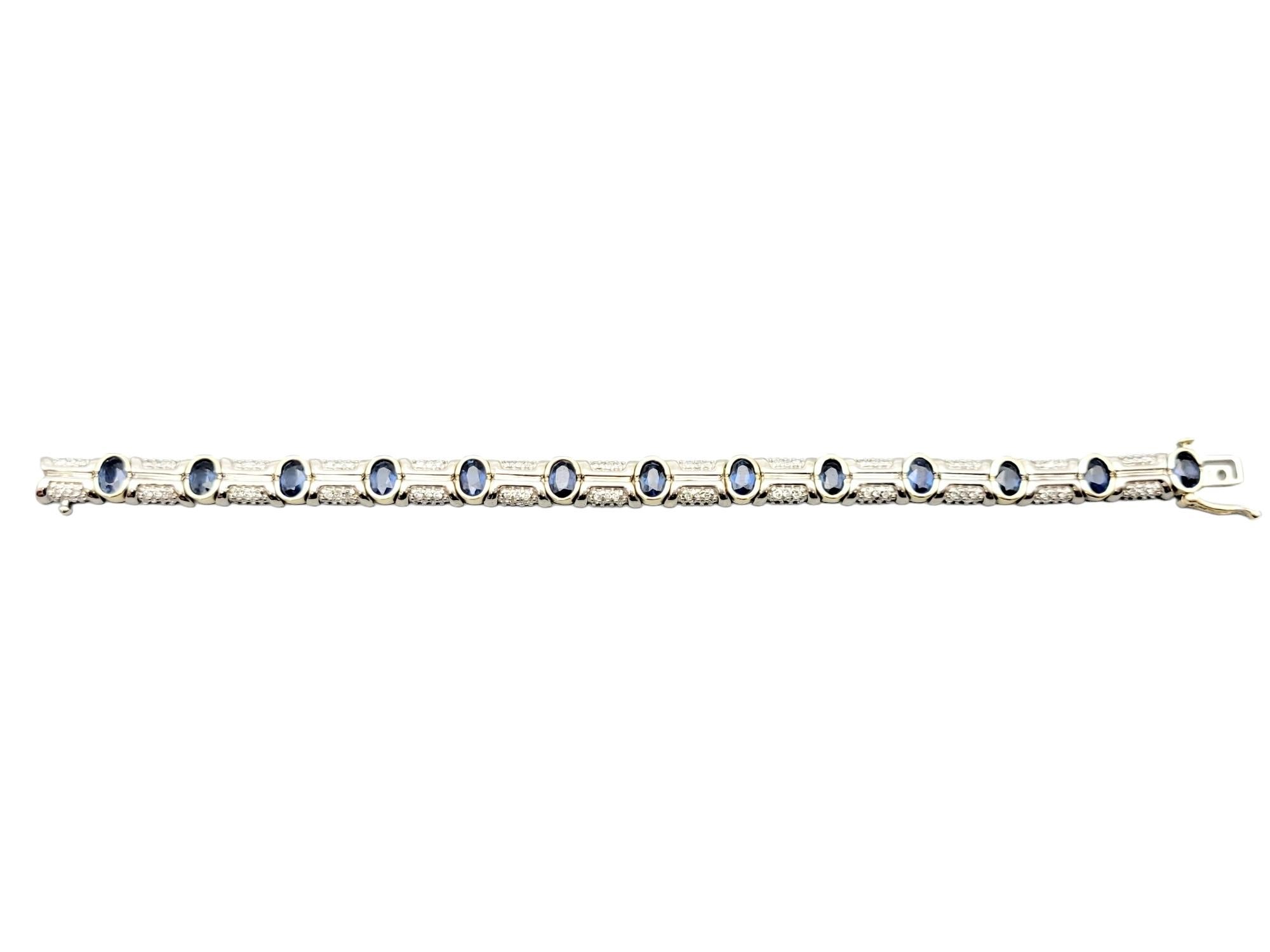 Contemporary Oval Blue Sapphire and Diamond Tennis Bracelet Set in Two-Tone 14 Karat Gold For Sale