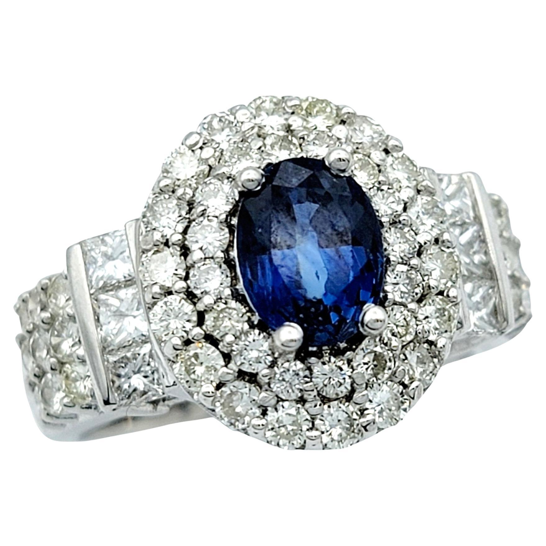 Oval Blue Sapphire and Double Diamond Halo Cocktail Ring in 14 Karat White Gold For Sale