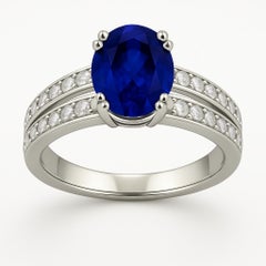 Oval Blue Sapphire and Zircon Engagement Ring with Distinctive Double Band