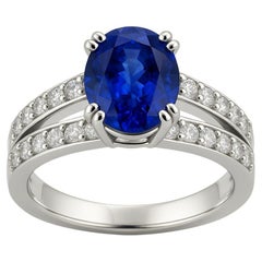Oval Blue Sapphire and Zircon Engagement Ring with Distinctive Double Band