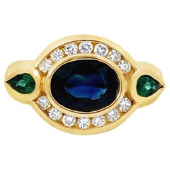 Oval Blue Sapphire Channel Set Diamond Halo Emerald Ring 14K Yellow Gold