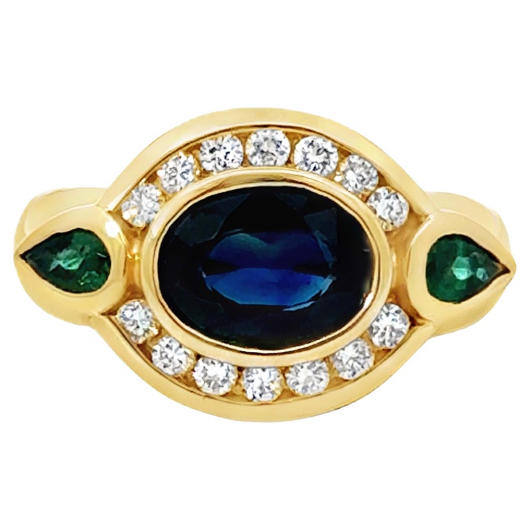 Oval Blue Sapphire Channel Set Diamond Halo Emerald Ring 14K