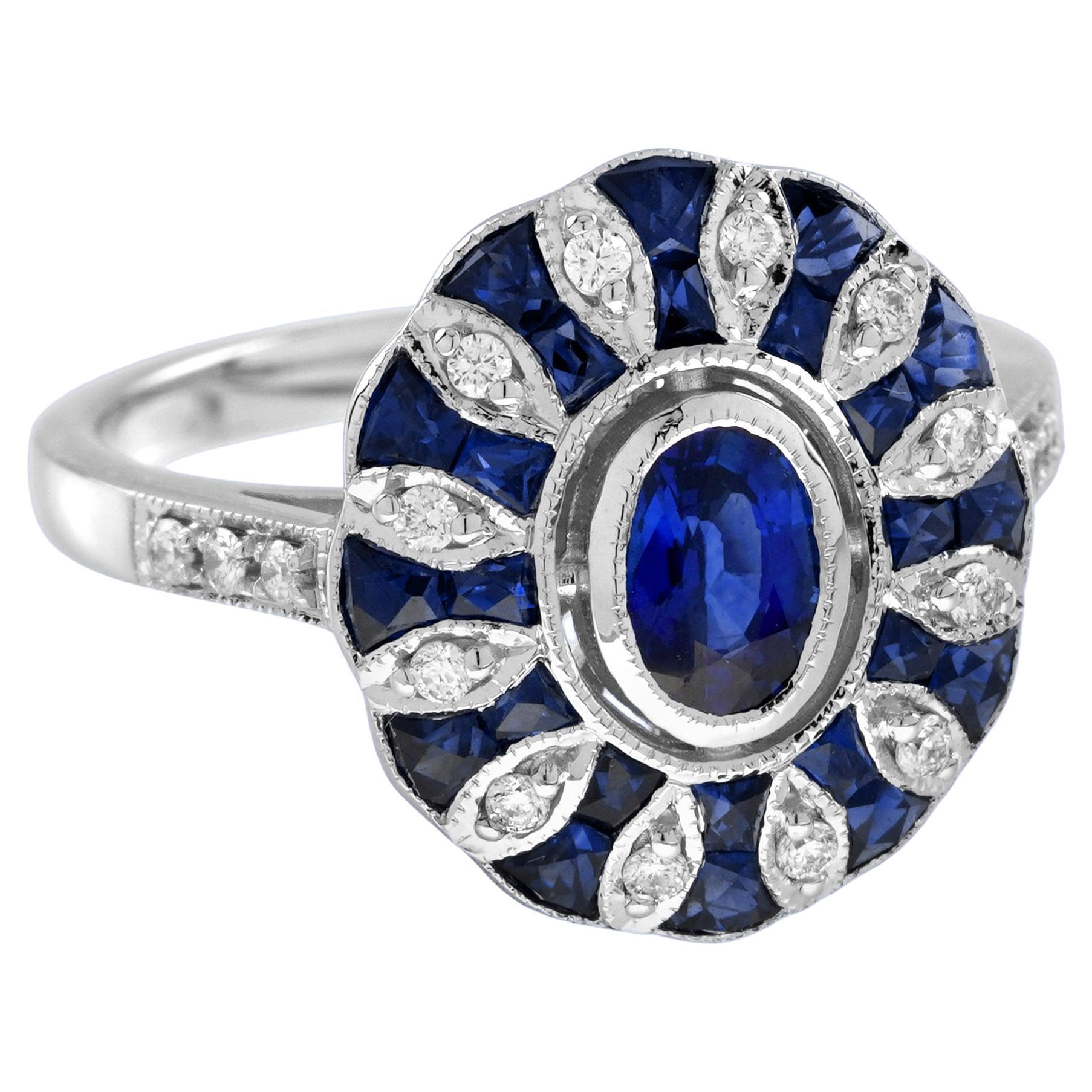 Anillo de oro blanco en mosaico con zafiro azul ovalado y diamantes estilo Art Déco engastado en halo