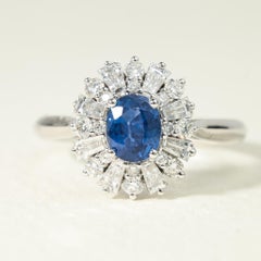 0.7ct Oval-Cut Blue Sapphire & Diamond Halo Engagement Ring in 18K White Gold