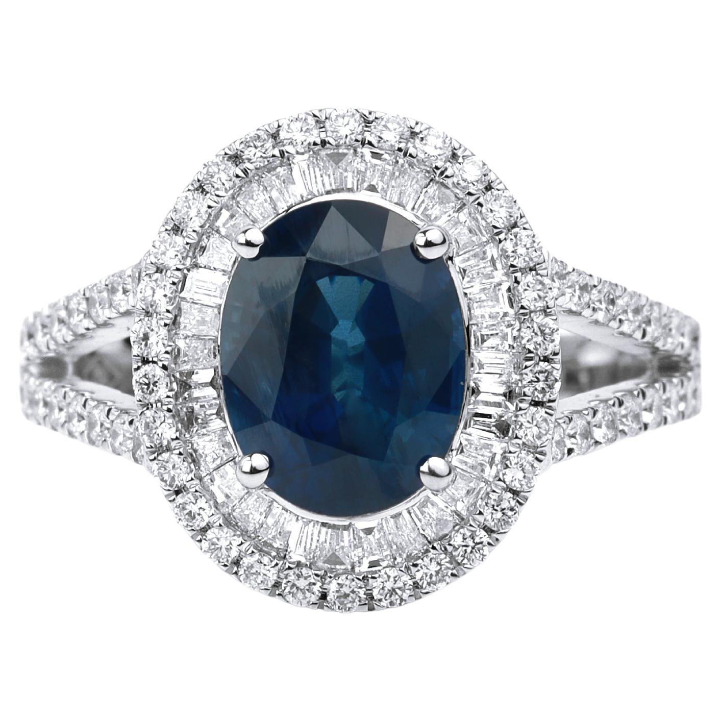 Bague de fiançailles cocktail en or blanc avec saphir bleu ovale et double halo de diamants