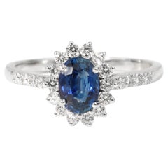 Oval Blue Sapphire Diamond Halo Cocktail Engagement Ring in 18k White Gold