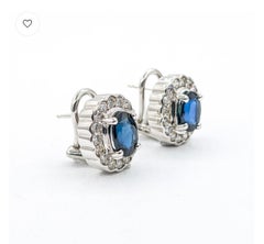 Oval Blue Sapphire & Diamond Halo Earrings in 14k White Gold