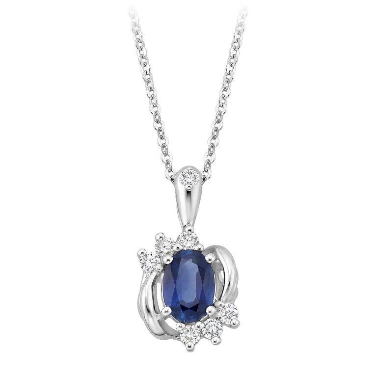 Material: 14k White Gold 
Center Stone Details: 0.83 Carat Oval Blue Sapphire 5 x 7 mm
Mounting Diamond Details: 7 Round White Diamonds Approximately 0.20 Carats - Clarity: SI / Color: H-I
Chain: 18 inch

Fine one-of-a-kind craftsmanship meets