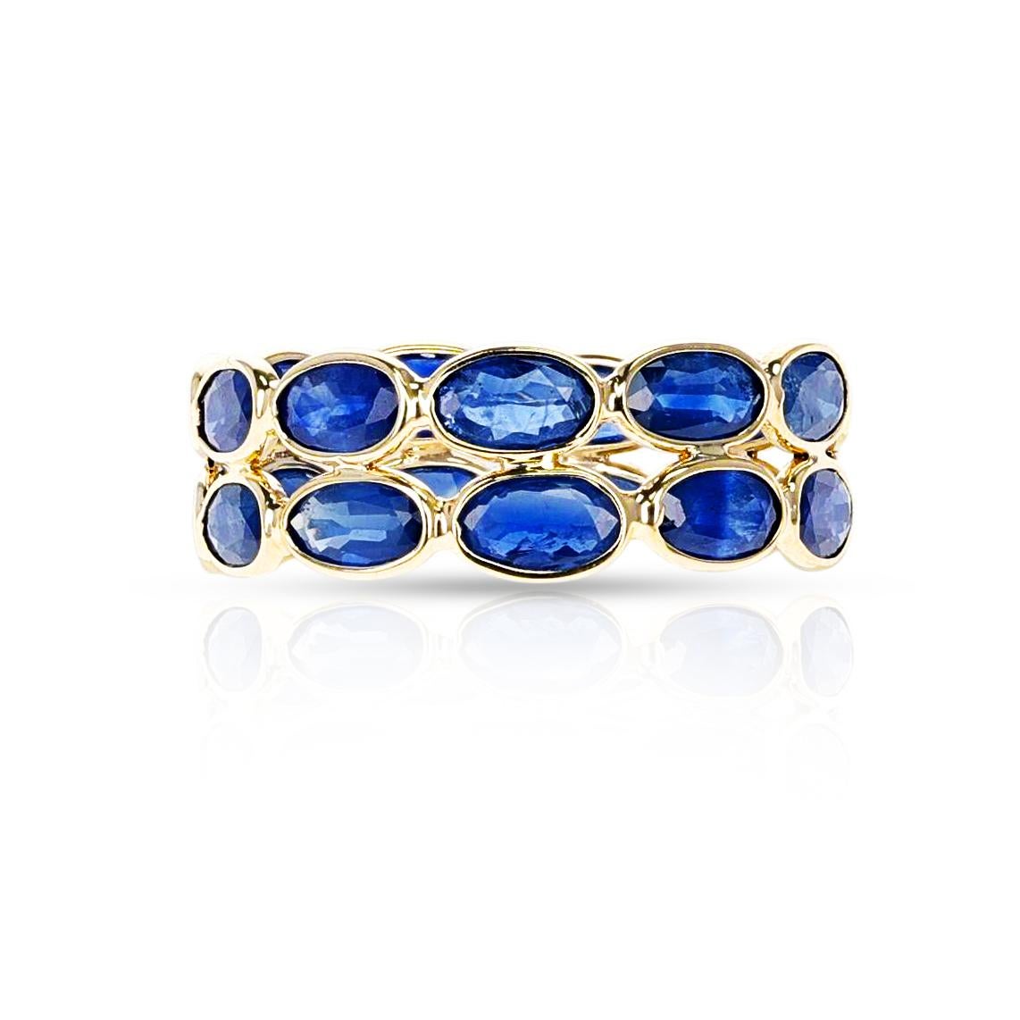Shape: Oval

Stone: Blue Sapphire

Metal: 14 Karat Yellow Gold (can be customized)

Style: Triple Layer Band

Ring Size: US 7 (can be customized)

Stone Weight: appx. 5 carats of Sapphires

Total Weight: 2 grams