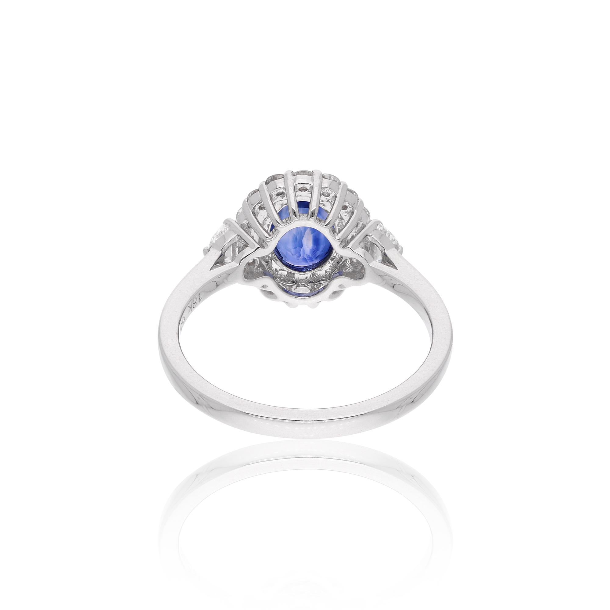 A cocktail ring featuring an oval blue sapphire gemstone and diamonds in 18 karat white gold is a stunning and elegant piece of jewelry. The ring typically showcases a central oval-shaped blue sapphire gemstone as the centerpiece.

Item Code :-
