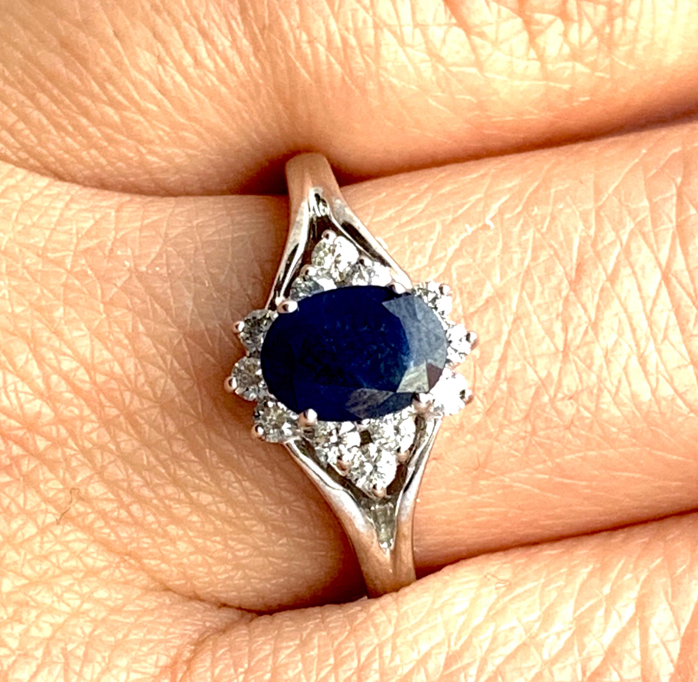 Oval Blue Sapphire Halo Engagement Ring 1