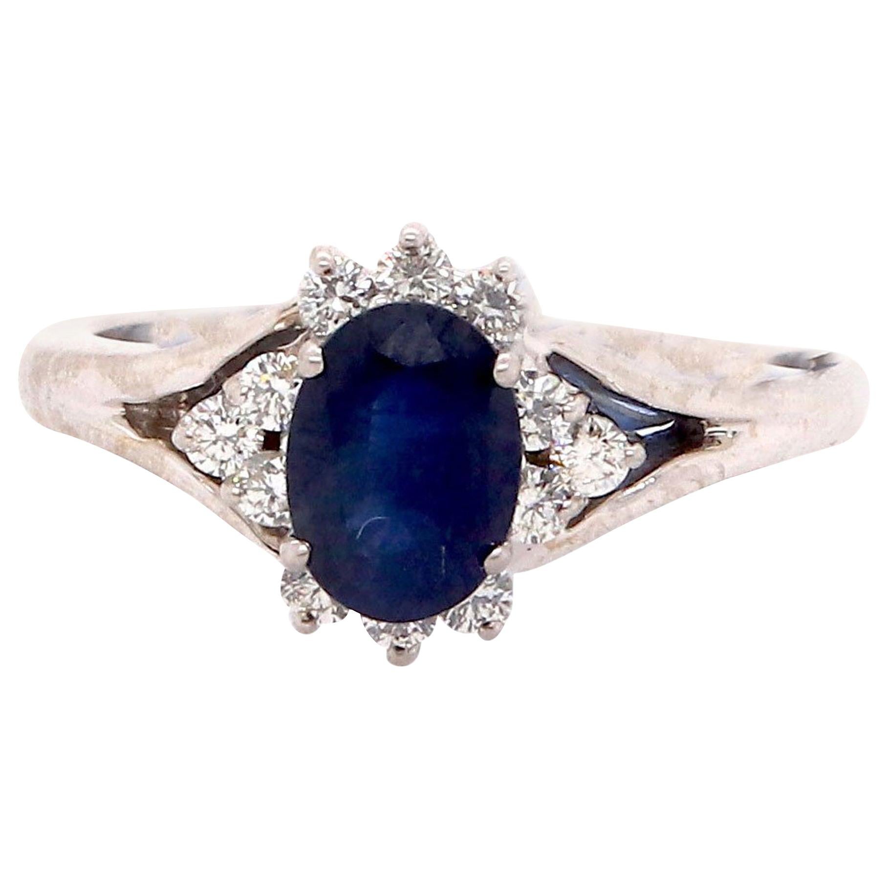 Oval Blue Sapphire Halo Engagement Ring