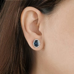 Oval Blue Sapphire Stud Earrings with Diamond Halo in 18k Solid White Gold