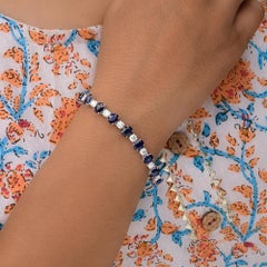 Bracciale tennis con zaffiro blu ovale e diamante rotondo in oro bianco 18 carati
