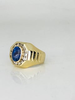 Oval Blue Sapphire, 3.00 Carat Set in Diamond Halo Ring