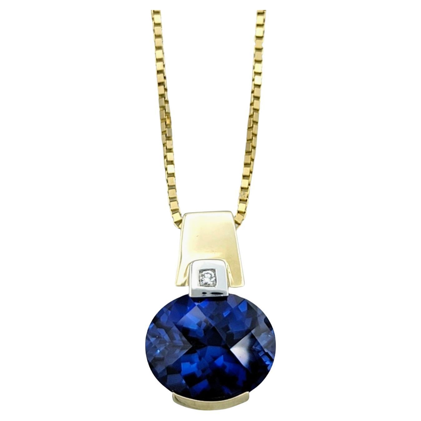 Oval Blue Synthetic Sapphire and Natural Diamond 14 Karat Gold Pendant Necklace For Sale