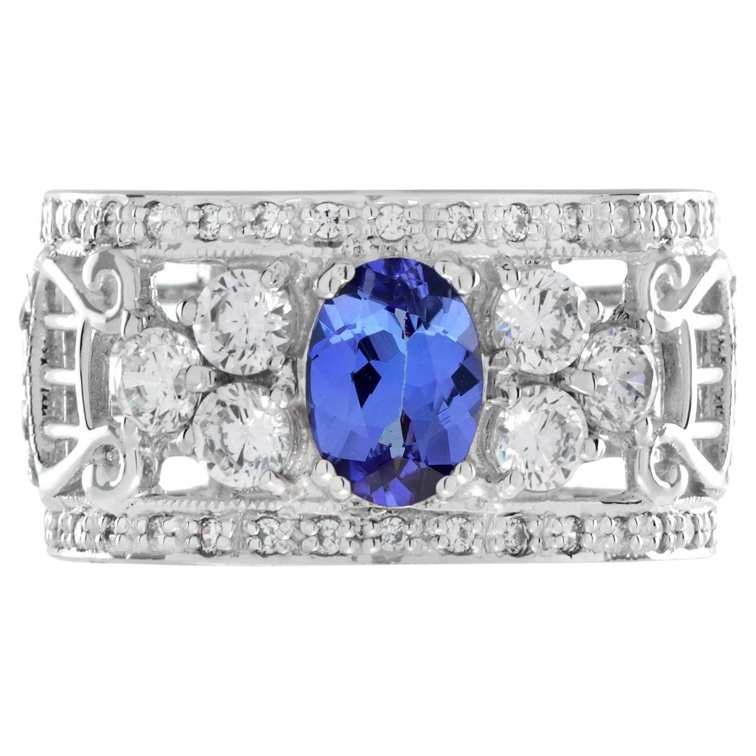 Anillo ancho de tanzanita azul ovalada y diamantes estilo eduardiano en venta